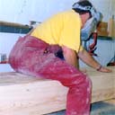 Peter sanding a giant TRS - so big we have to sand this beam whilst sitting on it!