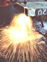 Welding sparks being deflected by Weld Stop Fabric